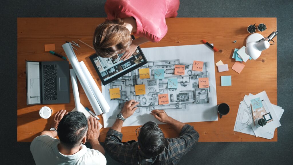 people having a design review meeting